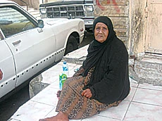 Woman on a Makkah Sidewalk