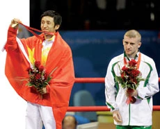 Zou, Zhang cap golden Olympic boxing effort
