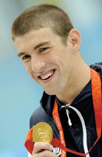Phelps joins elite band of Games greats