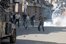 Protests sweep Kashmir again, 2 killed