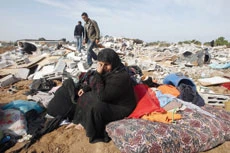 Rescue workers look for bodies