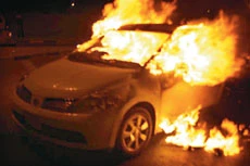 Bahrain protesters firebomb police car