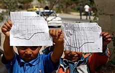 Planes drop warning pamphlets over Gaza