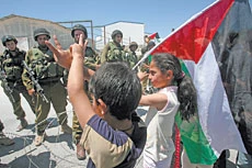 Israel rubbishes Obama call to halt settlements