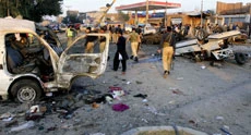 Car bomb kills 11 at Peshawar checkpoint