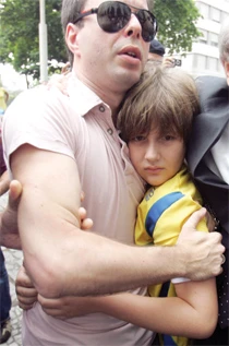 Boy finally reunited with US dad in Brazil