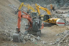 Draining of sewage lake begins