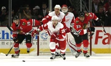 Huet, Blackhawks beat Red Wings 3-0