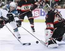Sharks hold off Blackhawks to take top spot in W. Conference