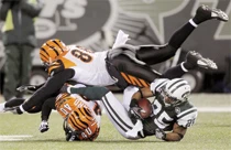 Jets earn playoff spot routing Bengals