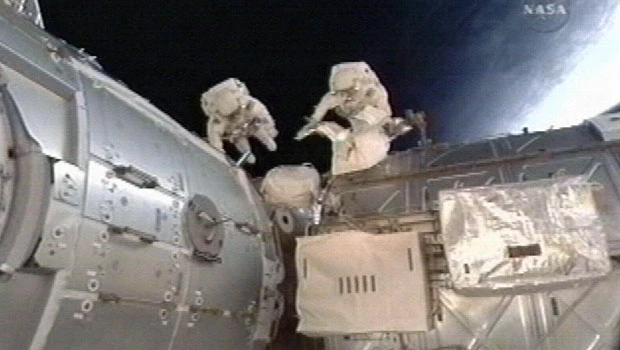 Astronauts take 2nd spacewalk to hook up plumbing