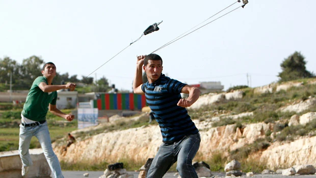 Hundreds mark 5th year of Israel barrier protests