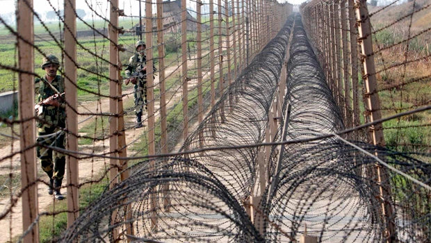 India says its border guards under fire from Pakistan ahead of talks