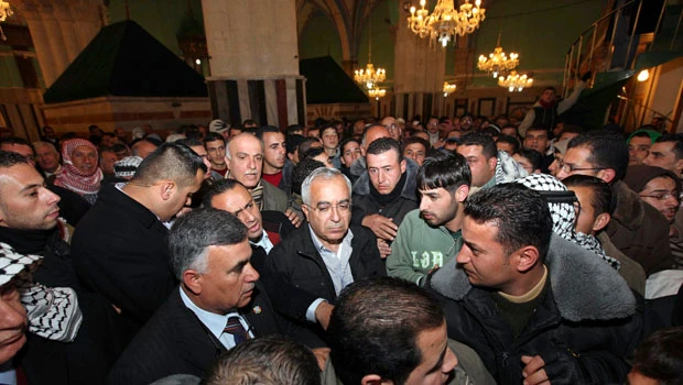 Palestinian premier visits contested biblical site