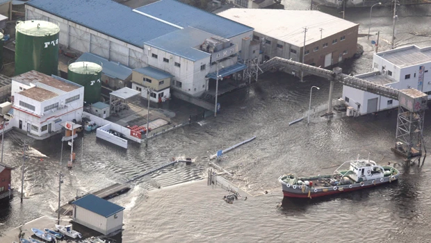 Tiny tsunami reaches Japan; Pacific damage small