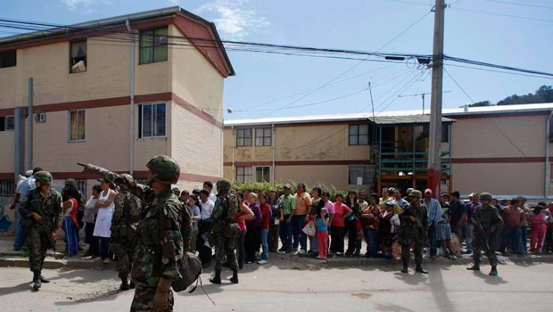 Death toll nears 800 as Chile steps up search for quake victims