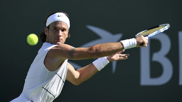Moya, Fish shrug off lapses to win at Indian Wells