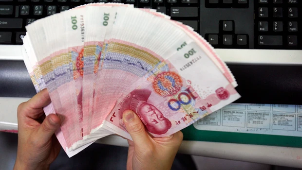 UN body tells China to avoid floating its currency