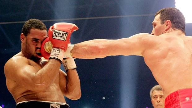 Klitschko knocks out Chambers to retain titles