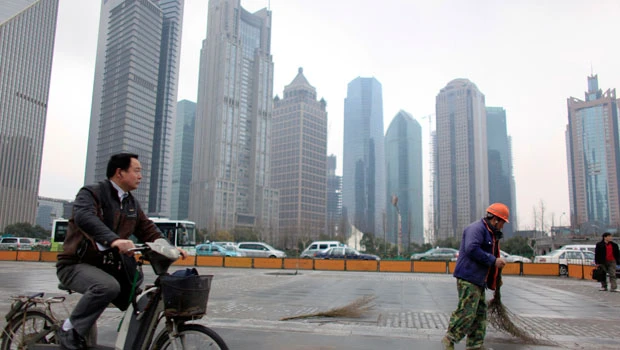 China vows moves on property prices, health care