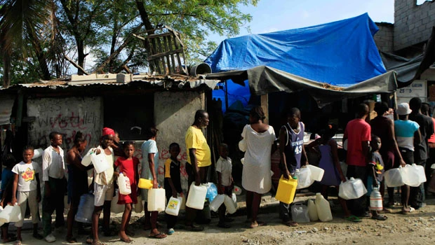 Heavy rains swamp camps holding Haiti's homeless