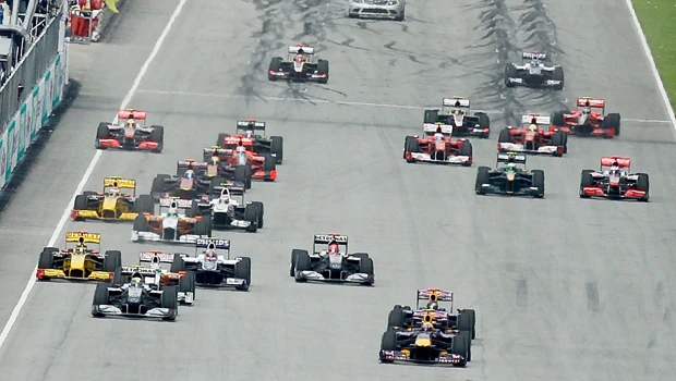 Vettel third time lucky for Red Bull