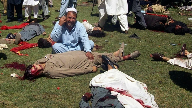 Bomb blast kills 45 in Pakistan; gunmen attack US Consulate