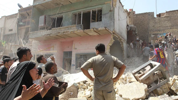 50 dead as Baghdad bombings stoke fears of warfare