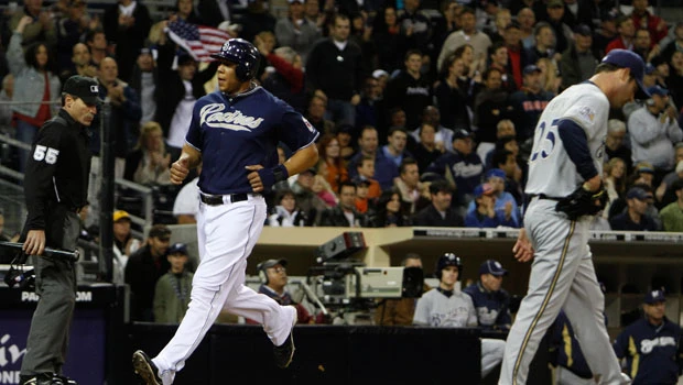 Padres set singles record, beat Brewers