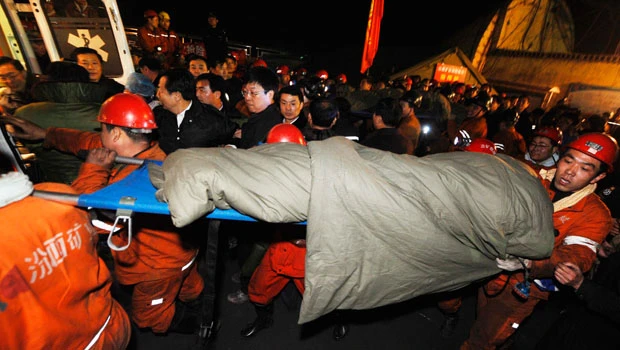 9 rescued from flooded Chinese mine after a week