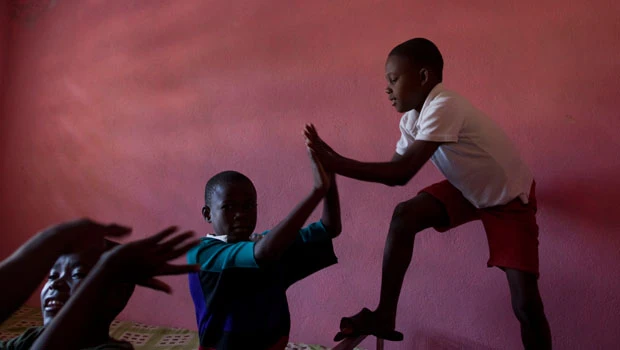 Divisions arise over push for adoptions from Haiti
