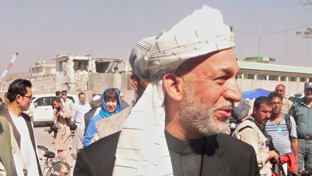 Karzai threatened to join Taleban, say lawmakers