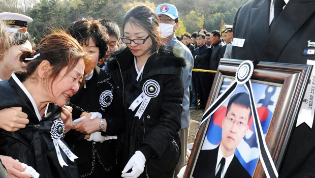 South Korea buries sailors killed in ship sinking