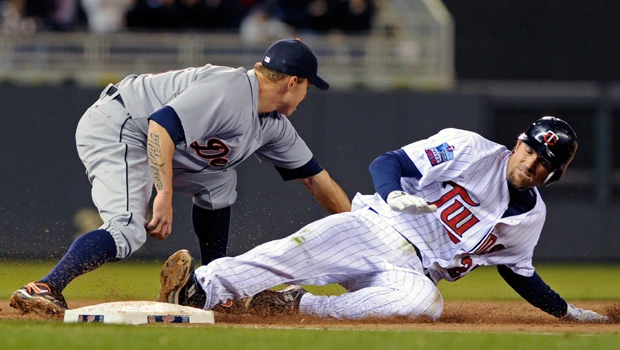 Grieving Tigers lose to Twins