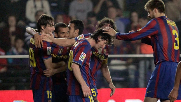Messi double puts Barcelona back on track