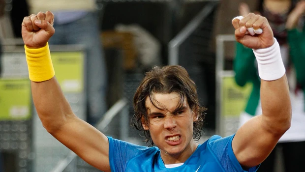Nadal puts away Isner to reach Madrid quarters
