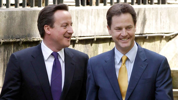 Britain welcomes new government's odd couple