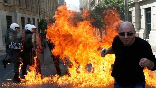 Greek unions protest expected austerity measures