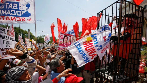 Thousands of Asians rally for jobs, pay on May Day