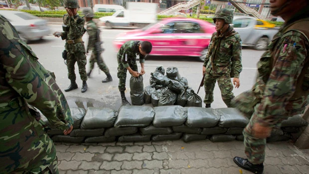 New Thai violence kills 2, mars compromise moves