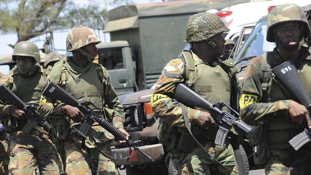 Jamaica cops attack drug lord's slum stronghold