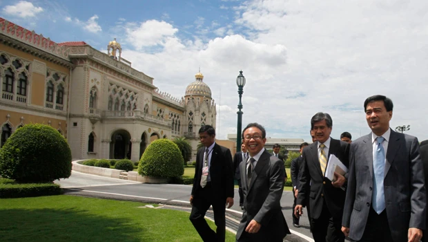 Opposition moves to impeach Thai PM; curfew stays