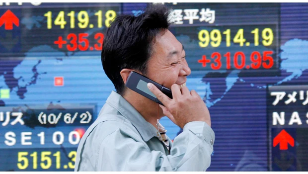 BOJ warns on public debt as Japan seeks new PM