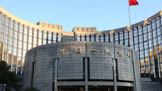 Yuan shot heard round the world but quiet in China