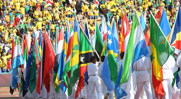 Soccer World Cup party starts; mourning Mandela absent