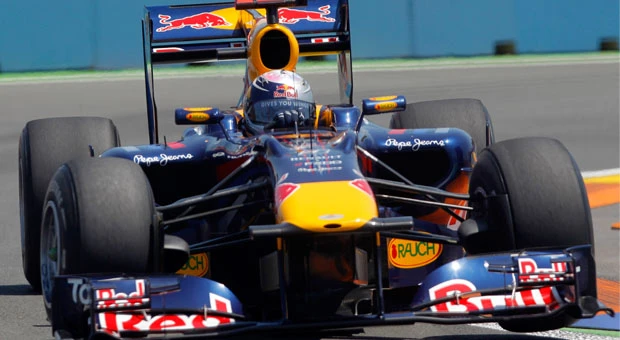 Vettel takes pole with Webber alongside