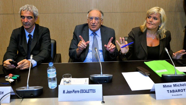 France denies interference, keeps debating