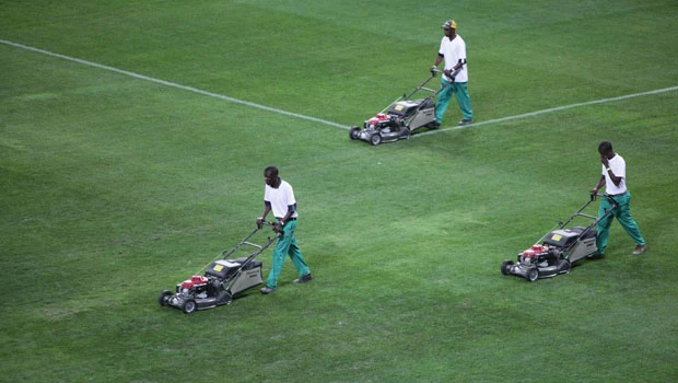 Artificial grass woven into real turf at World Cup