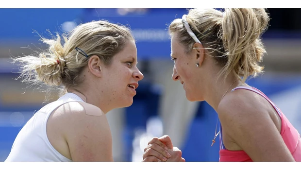 Clijsters bows out, Stosur advances