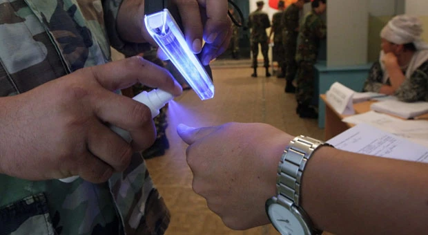 Kyrgyz troops, on high alert, vote in referendum